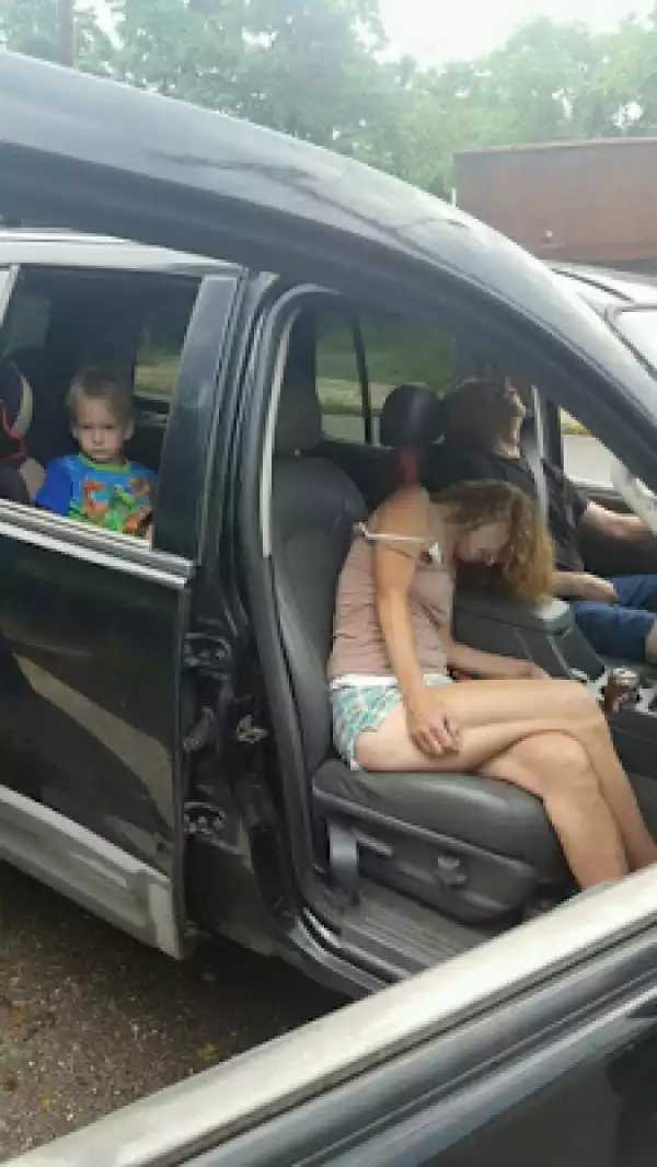 Police release shocking photos of overdosed parents with child in backseat